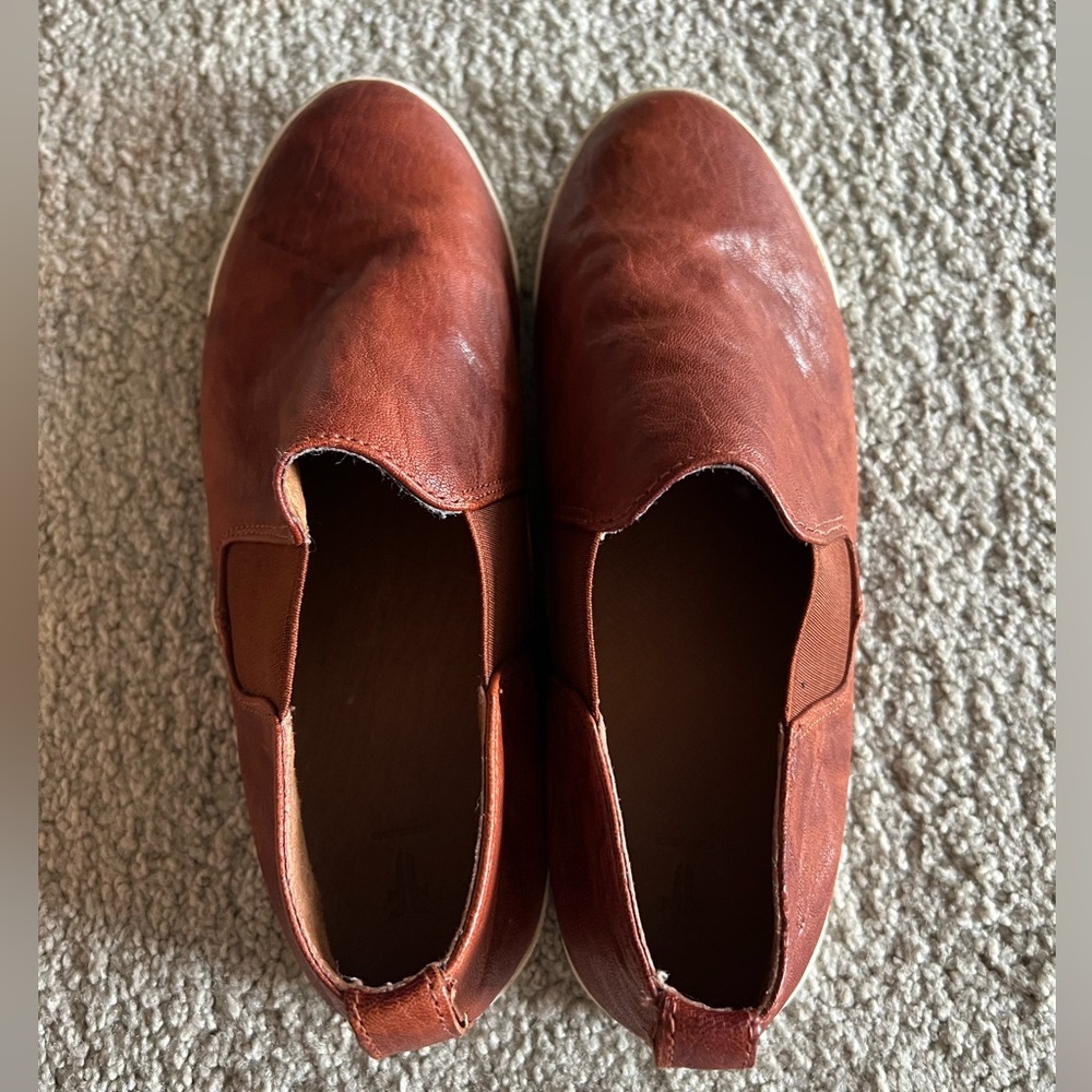 Brown leather Frye slip ons. Size 9.